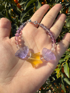 Handmade Fluorite Beaded Bracelet with Star and Wing Charms