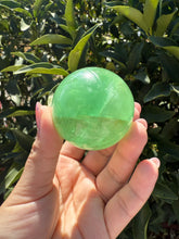 Load image into Gallery viewer, Green Fluorite Crystal Sphere – Discounted for Minor Flaw
