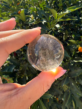 Load image into Gallery viewer, Small Light Smoky Quartz Crystal Sphere
