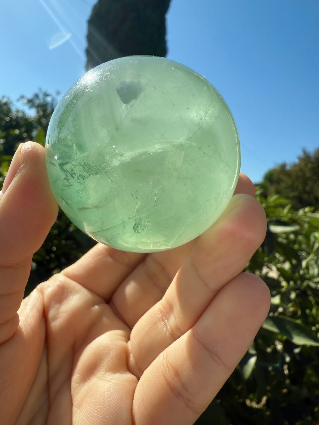 Green Fluorite Crystal Sphere with Unique Crystal Cavities Mineral Inclusions