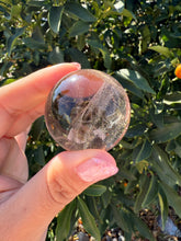 Load image into Gallery viewer, Small Light Smoky Quartz Crystal Sphere
