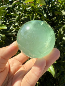 Green Fluorite Crystal Sphere with Unique Crystal Cavities Mineral Inclusions